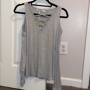 grey top never worn with tags!